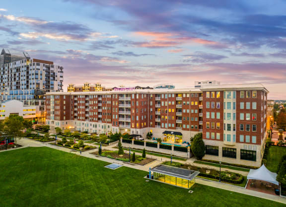 an aerial view of a large apartment building in the city