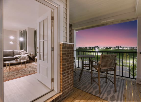 A balcony at The Strand Townhomes overlooking the pond at Beulah Park in Grove City Ohio near Columbus