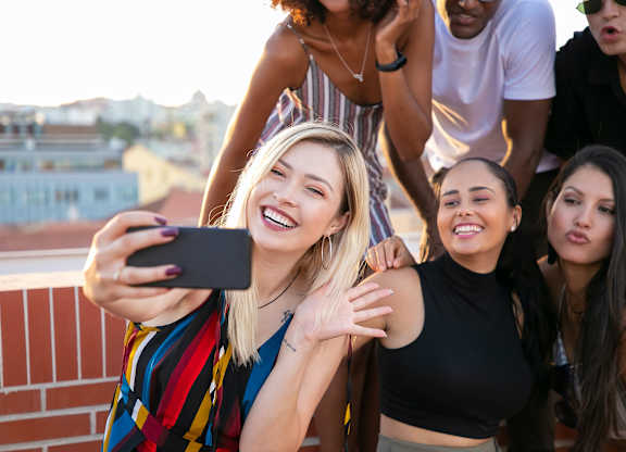 A group of friends taking a selfie together.