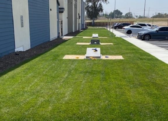 a row of ping pong tables in the grassat Westbury Apartments, Rancho Cucamonga, CA