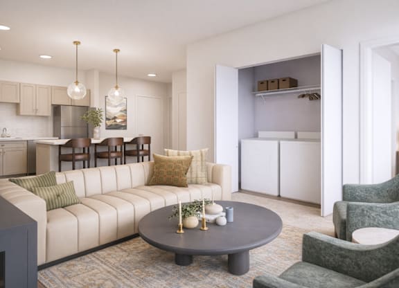 A modern living room with a grey coffee table and a white sofa.