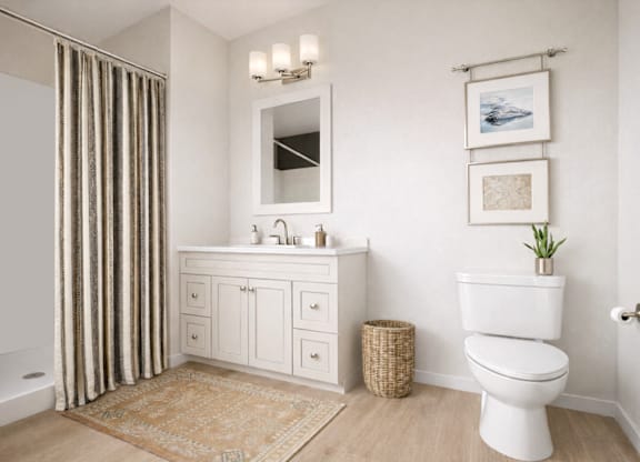 A bathroom with a white toilet, a white sink, and a white cabinet.