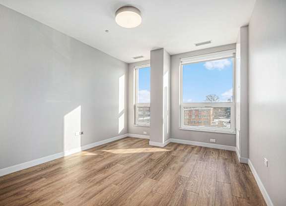 Energy Efficient Windows and wooden flooring at Thrive Exchange, Chicago, IL, 60617