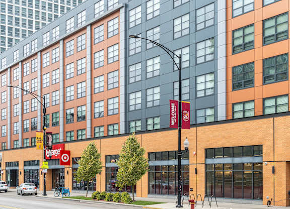a rendering of a large building on a city street