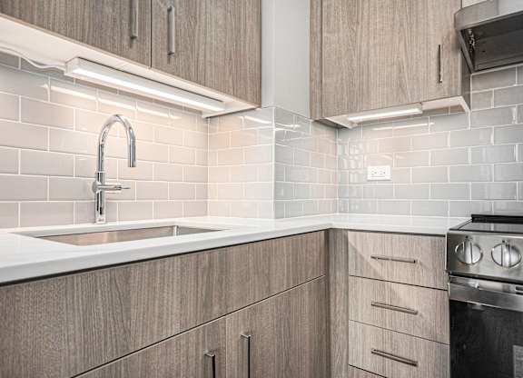 Stainless Steel Sink With Faucet In Kitchen at Thrive Exchange, Chicago, IL, Illinois