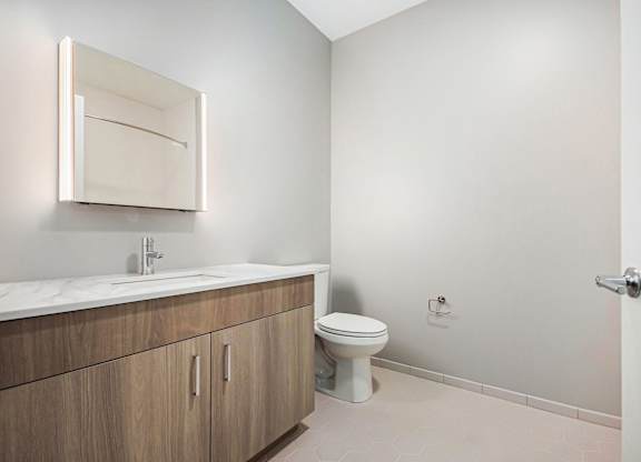Modern Bathroom with Framed Mirror at Thrive Exchange, Chicago, Illinois