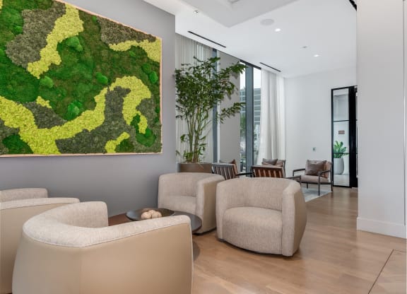 a living room with couches and chairs and a large artwork on the wall  at Cassidy on Canal, Chicago, Illinois