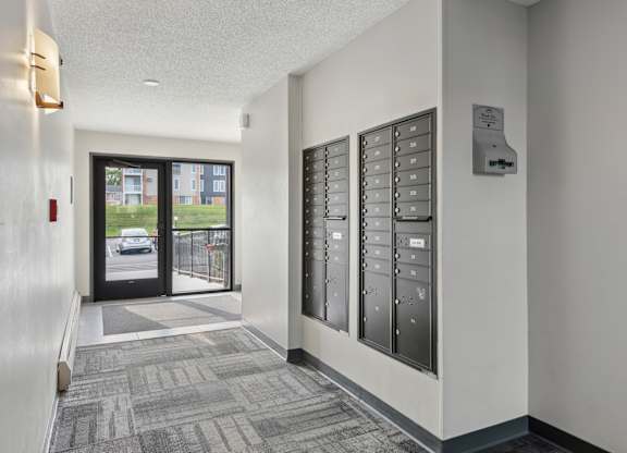 Mailroom with secure resident mailboxes at Cedarvale Highlands Apartments, Minnesota