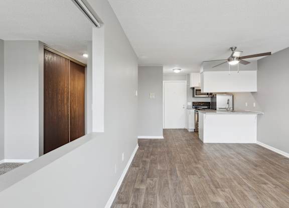 Modern open concept apartment with kitchen island at Cedarvale Highlands Apartments, Eagan, MN 55122