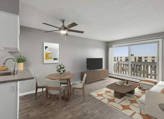 Modern living room with dining area and ceiling fan at Cedarvale Highlands Apartments, Minnesota, 55122
