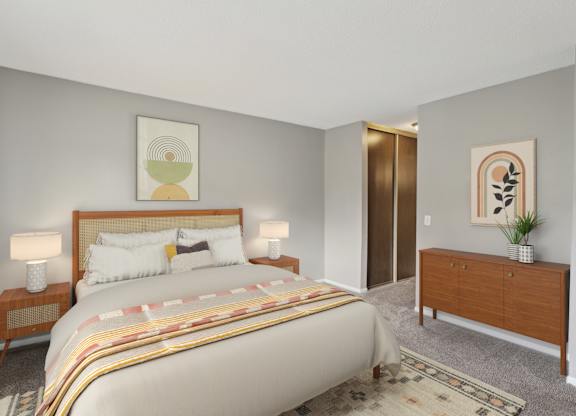 Master bedroom with mid century modern furniture at Cedarvale Highlands Apartments, Eagan, MN