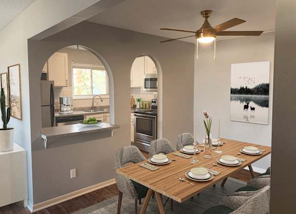 Dining room with arched kitchen pass through at Cedarvale Highlands Apartments, Eagan, 55122