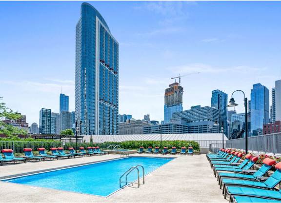 outdoor pool and sundeck with views at Kingsbury Plaza, Chicago, 60654