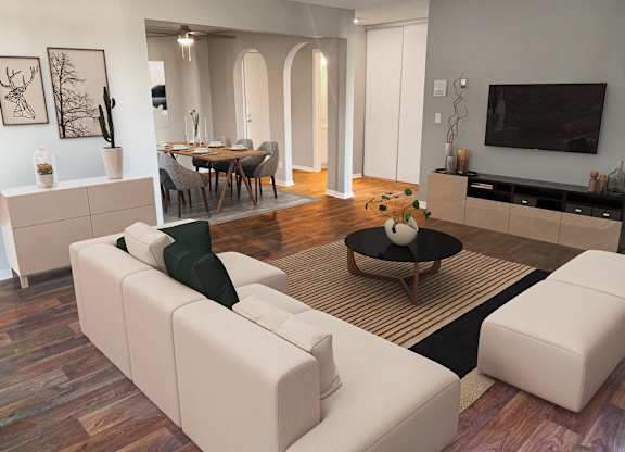Living room with sectional sofa and entertainment center at Cedarvale Highlands Apartments, Eagan