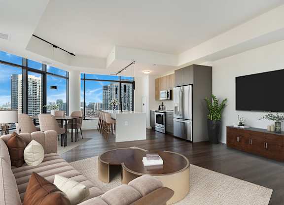 a living room with a couch and a table at Cassidy on Canal, Chicago, IL, 60606