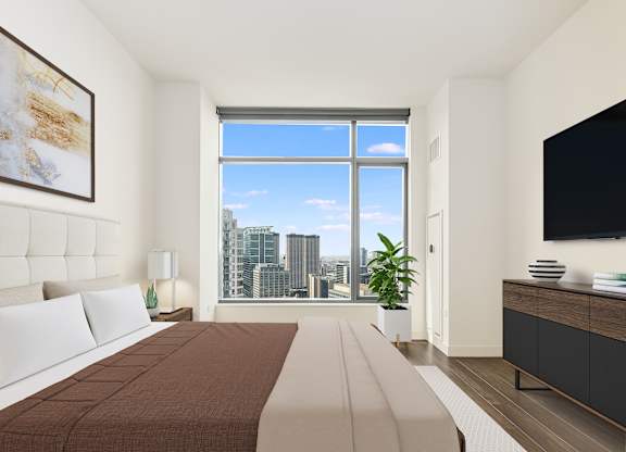a bedroom with a bed and a large window at Cassidy on Canal, Illinois, 60606