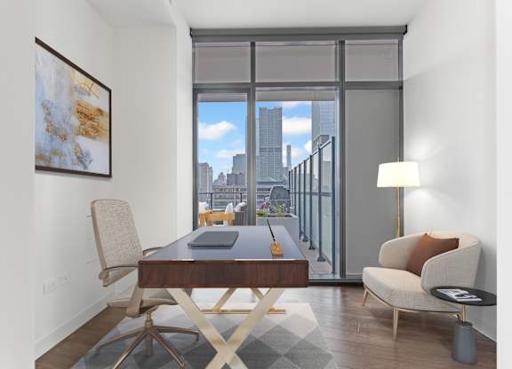 a home office with a desk and a view of the city at Cassidy on Canal, Chicago, IL, 60606