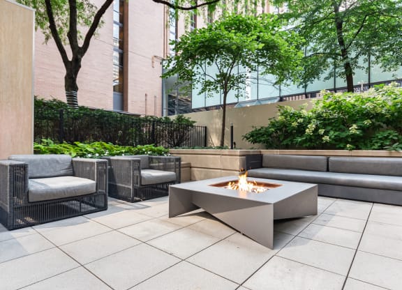 Fire pit and seating area at Columbus Plaza, Illinois