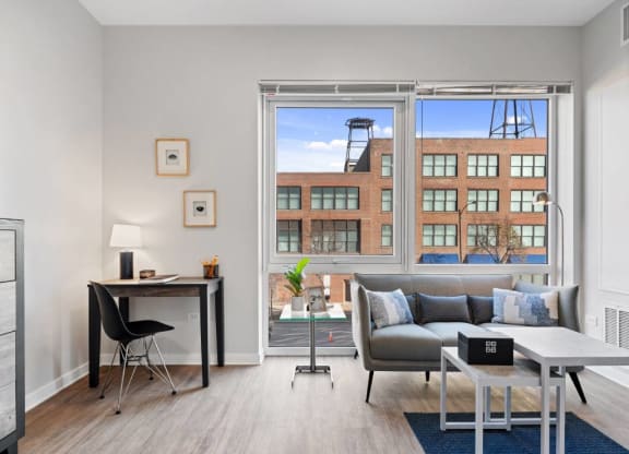 Living Area With Study Table at 23rd Place Apartment, Chicago, IL, 60654