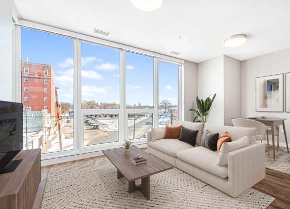 Modern Living Room Brimming with Colors and large window at Thrive Exchange, Chicago, IL, 60617