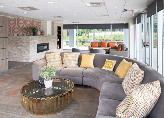 Community lounge area with fireplace at The Pavilion, Michigan, 48207