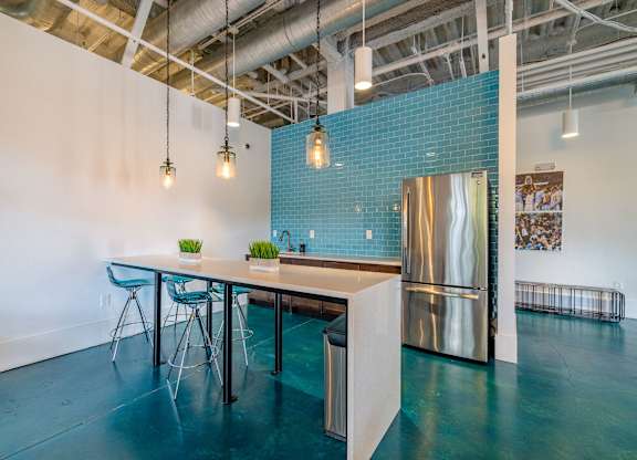 A kitchen area with a table and chairs at 1701 North Apartment Homes Apartments, Chapel Hill, 27514