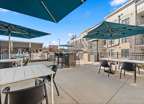 Outdoor Picnic Area with Tables and Chairs at Views at Flowers, Clayton, NC, 27527