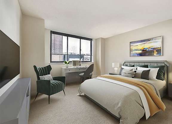 A bedroom with a large bed, a chair, and a painting on the wall.
