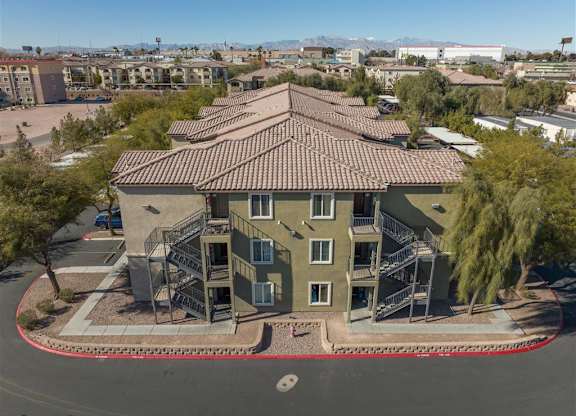 A large apartment complex with a red circle around it.