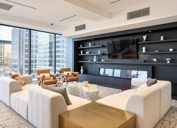 a living room filled with furniture and a large window at 220 Meridian, Indianapolis, IN 46204