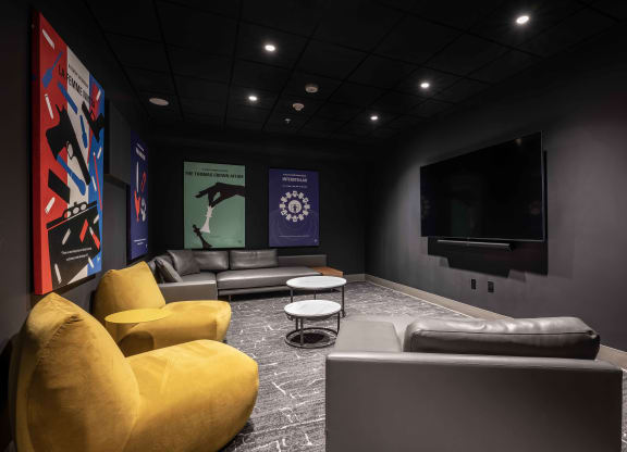 a living room filled with furniture and a flat screen tv at 220 Meridian, Indianapolis, IN, 46204