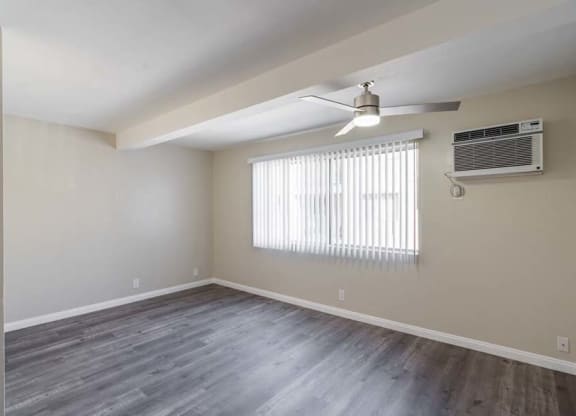 an empty room with a ceiling fan and a window at Mountainview Venture, California, 91722