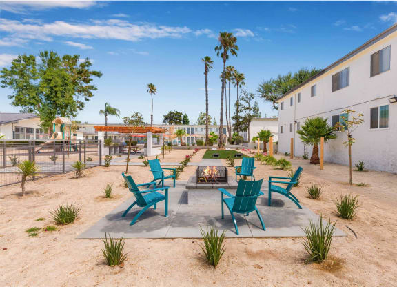 an outside patio with chairs and a fire pit at Sunnymead Apts Apartments, Moreno Valley, 92553