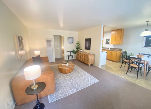 a living room with a couch and a table at Bowles Apts, Azusa, 91702