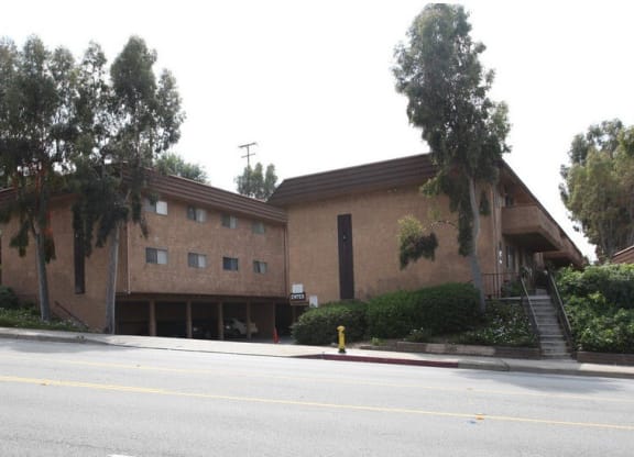 a brown building on the side of a street at North View Terrace, California, 90640