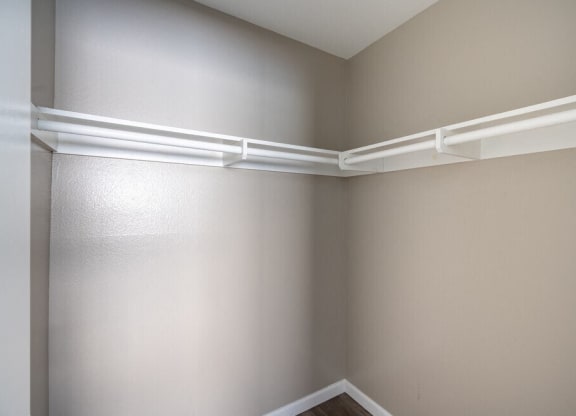 the corner of a room with white shelves on the wall at North View Terrace, Montebello, 90640