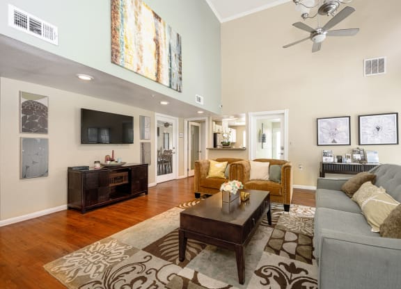 a living room filled with furniture and a ceiling fan at Sagewood Gardens Senior Apartments, California, 91745