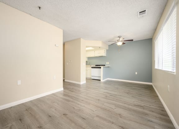 a bedroom with hardwood floors and a ceiling fan at Sagewood Gardens Senior Apartments, Hacienda Heights California