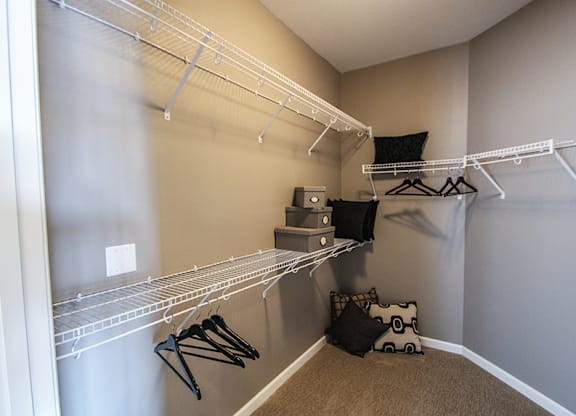 a walk in closet in a bedroom  at Victoria Park and V2 Apartments, St. Paul, MN, 55102