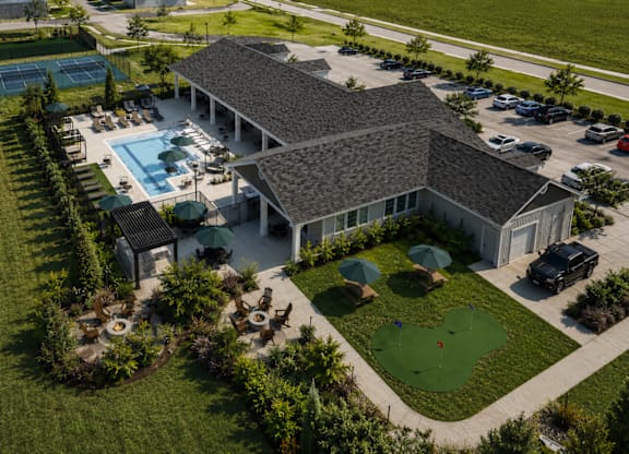 A large house with a pool in the backyard.