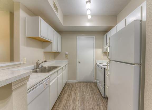 One and two bedroom apartment homes featuring efficient appliances, hardwood floors, walk-in closets, washer and dryer connections and much more at Parham Pointe Apartments in Little Rock, AR