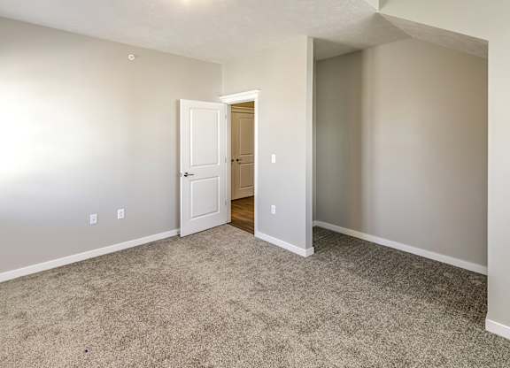 Bedroom at Deerfield Apartments and Chateaus in Fremont, NE