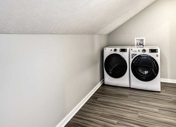 Laundry room at Deerfield Apartments and Chateaus in Fremont, NE