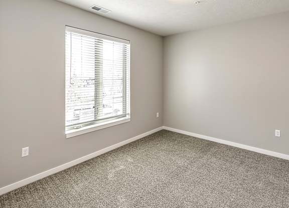 Bedroom at Deerfield Apartments and Chateaus in Fremont, NE