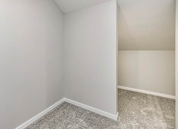 Bedroom at Deerfield Apartments and Chateaus in Fremont, NE