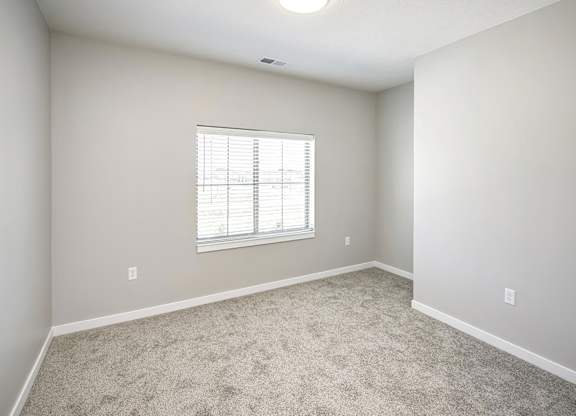 Bedroom at Deerfield Apartments and Chateaus in Fremont, NE