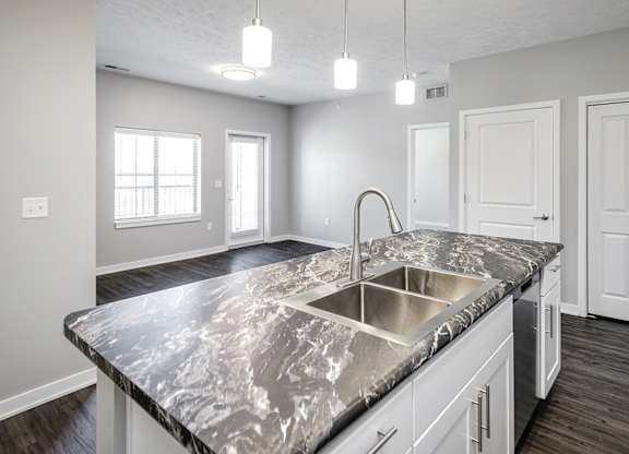 Kitchen island at Deerfield Apartments and Chateaus in Fremont, NE