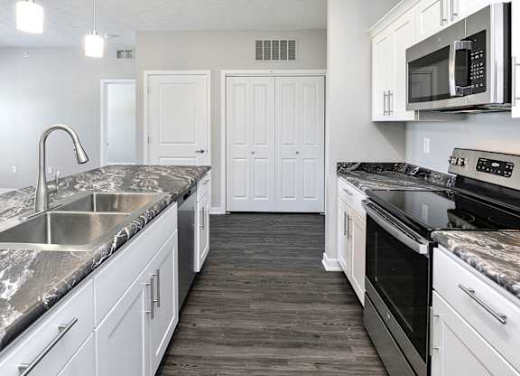 Kitchen at Deerfield Apartments and Chateaus in Fremont, NE