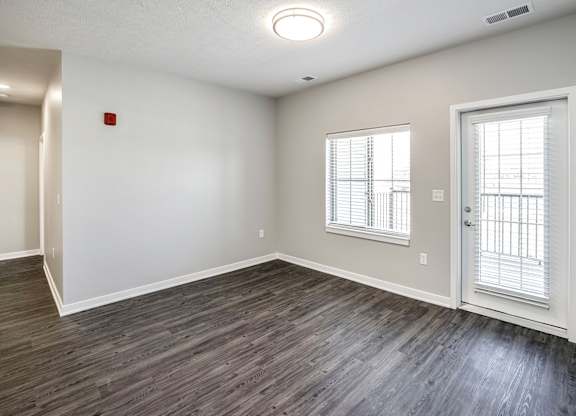 Living Room with Natural Lighting at Deerfield Apartments and Chateaus in Fremont, NE
