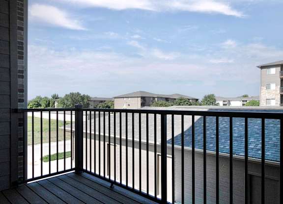 Balcony at Deerfield Apartments and Chateaus in Fremont, NE